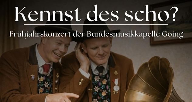 Two men in traditional attire are listening to a gramophone. The image refers to the spring concert of the Federal Music Band Going.