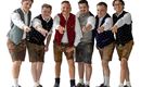 Six men in traditional Bavarian attire stand side by side, pointing forward with their fingers. They are wearing lederhosen and colorful vests that appear festive and inviting.