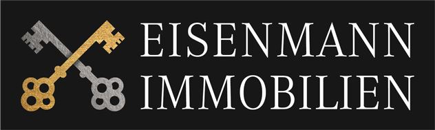 Ein Logo von Eisenmann Immobilien. Es zeigt zwei Schlüssel in Gold und Blau auf schwarzem Hintergrund.