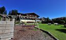 Söll_Alpenpanorama_Wilder Kaiser_Gartenanlage