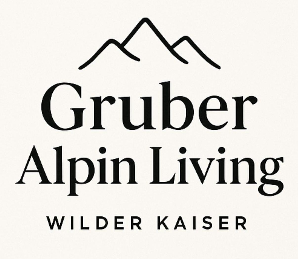 Ein elegantes Logo mit dem Schriftzug "Gruber Alpin Living" und einer stilisierten Bergsilhouette. Der Name weist auf alpine Wohnmöglichkeiten in der Region Wilder Kaiser hin.