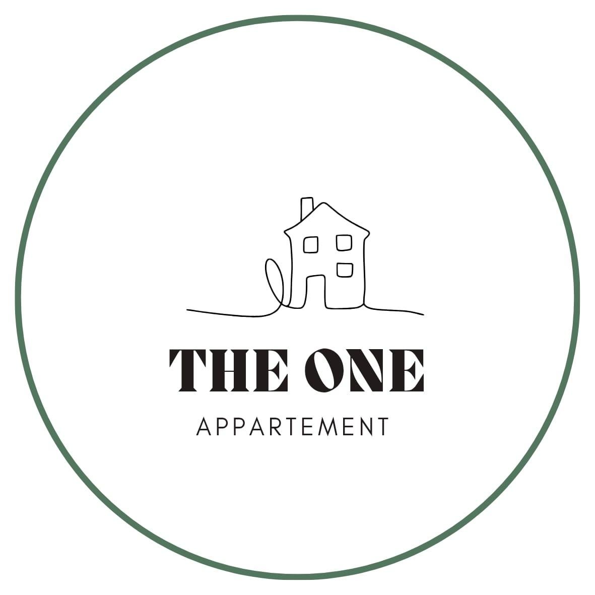 A simple and modern logo for an apartment. It features a stylized house drawing with the name "THE ONE" in clear letters.