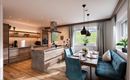 Modern kitchen with wooden shelves and a dining area. The space is bright and friendly with plants and elegant furniture.