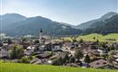 wilder-kaiser-ortsansicht-soell-sommer