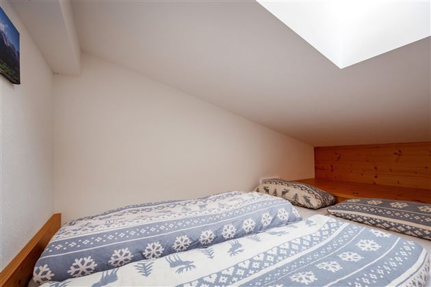 Berghof_Kirchbichl_Ellmau_Top_94_Schlafzimmer_3