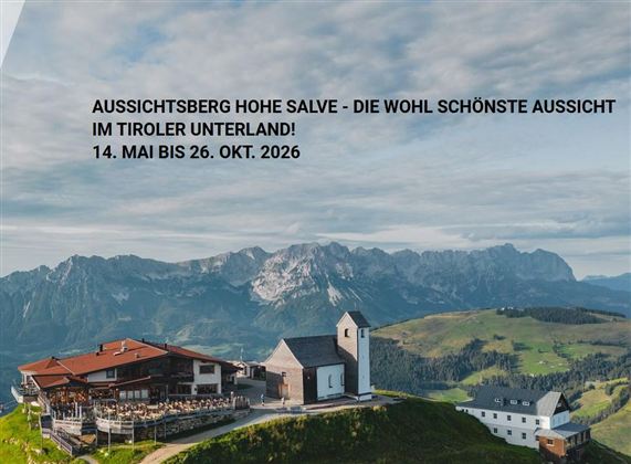 A picturesque view of the mountain landscape of Hohe Salve with an inviting mountain hut in the foreground. The scene conveys a sense of tranquility and connection to nature.