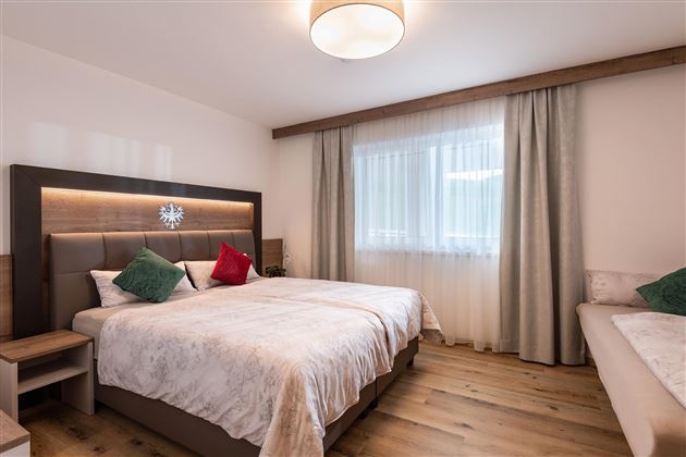 Söll_APARTdeluxe_Schlafzimmer_Panorama_Suite