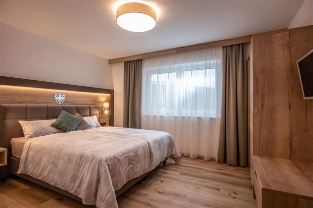 Söll_APARTdeluxe_Schlafzimmer_WilderKaiser