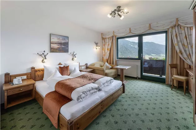 Söll_Hotel_AlpenSchlössl_Zimmer_WilderKaiser