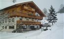 Berggasthof Moosbauer Erl - Haus im Winter