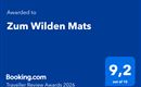 Auszeichnung für das Hotel "Zum Wilden Mats" mit einer Bewertung von 9,2 von 10. Verliehen von Booking.com für die Traveller Review Awards 2026.