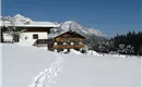 Haus Winter mit Winterlandschaft