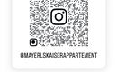 A QR code that leads to an Instagram profile. Below it is the username "@MAYERLSKAISERAPPARTEMENT".