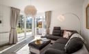 Großzügiges und modernes Wohnzimmer mit der Möglichkeit die Wohnzimmercouch in eine Schlafcouch für zwei Personen zu verwandeln.<br/>Ein großer Wohnschlafraum gewährt Ausblick in die bezaubernde Berglandschaft von Westendorf. Das Wohnzimmer führt direkt auf die große Holzterrasse mit modernem Terrassenmöbel, die zum Frühstücken oder für entspannte Abende bei wunderschönen Sonnenuntergängen einlädt.