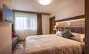 Söll_APARTdeluxe_Schlafzimmer_WilderKaiser