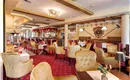 Söll_Hotel_AlpenSchlössl_Lounge_WilderKaiser