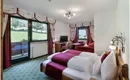 Söll_Hotel_AlpenSchlössl_Zimmer_WilderKaiser