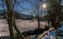 Sonnentalhof Bach Sonne Blick Winter Feratel