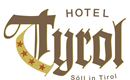 Das Logo des Hotels Tyrol in Söll, Tirol. Es zeigt den Schriftzug mit dekorativen Elementen und Sternen.