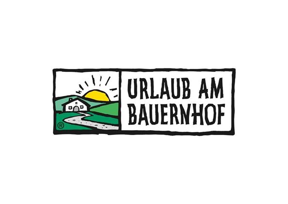 A logo for "Vacation on the Farm". It features an idyllic landscape with sun and a house.