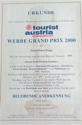 A certificate that awards the "Advertising Grand Prix 2000" to the Kopp vacation home. The award comes from Tourist Austria and highlights the achievements of the property.