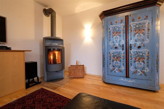 Wohnzimmer mit finnischen Ofen